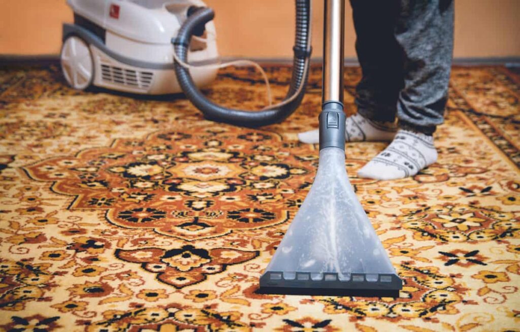 Rug or car carpet being professionally cleaned